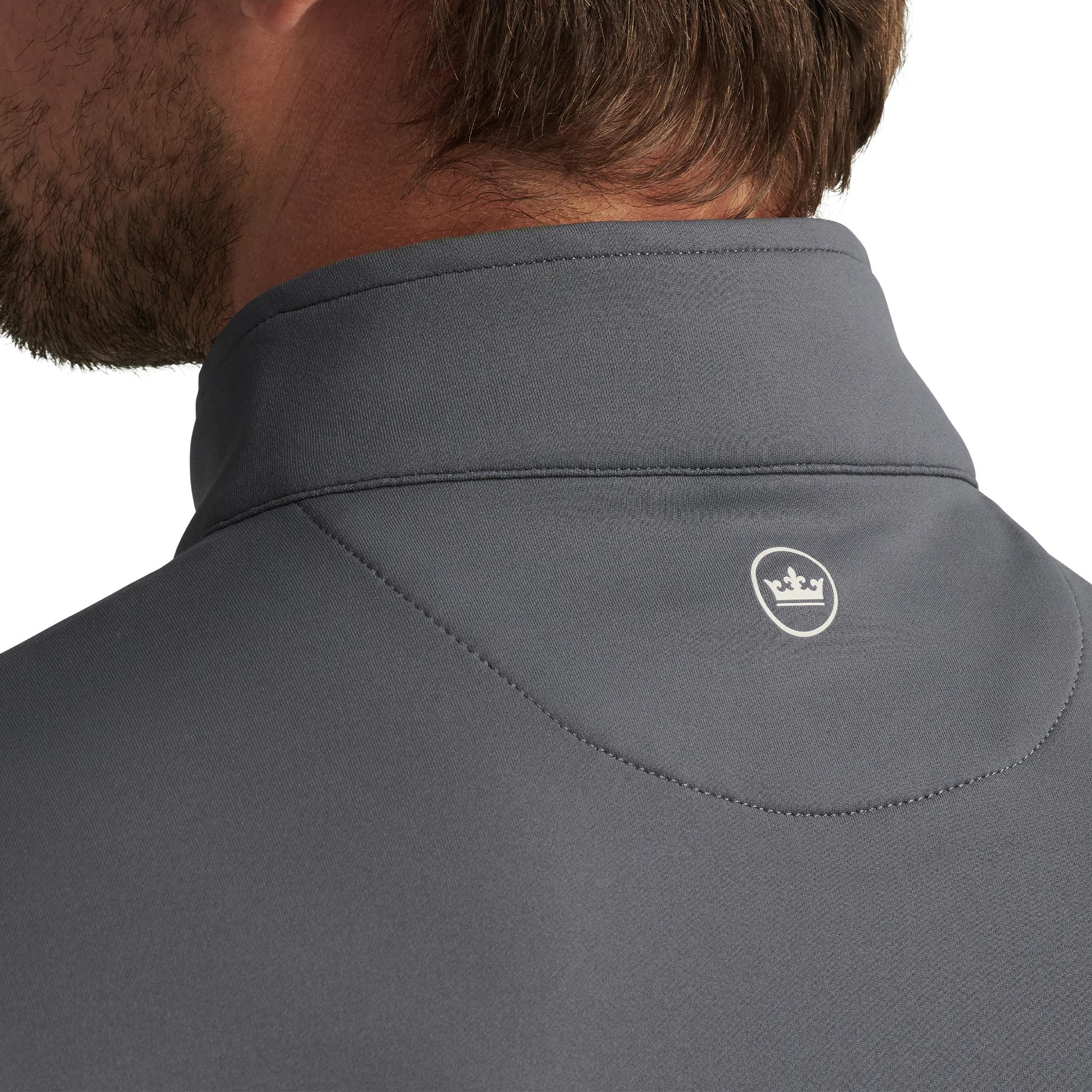 Peter Millar logo on back collar of Galway Stretch 1/4 Zip Vest – premium mens golf gilet and designer golf wear